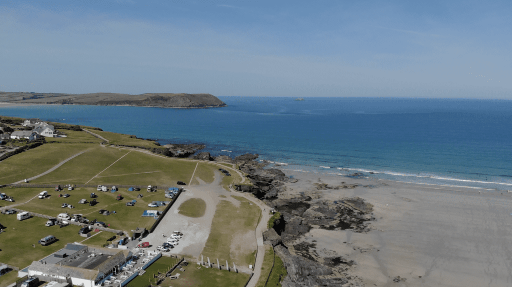 An aerial view of Polzeath Beach in Cornwall, England